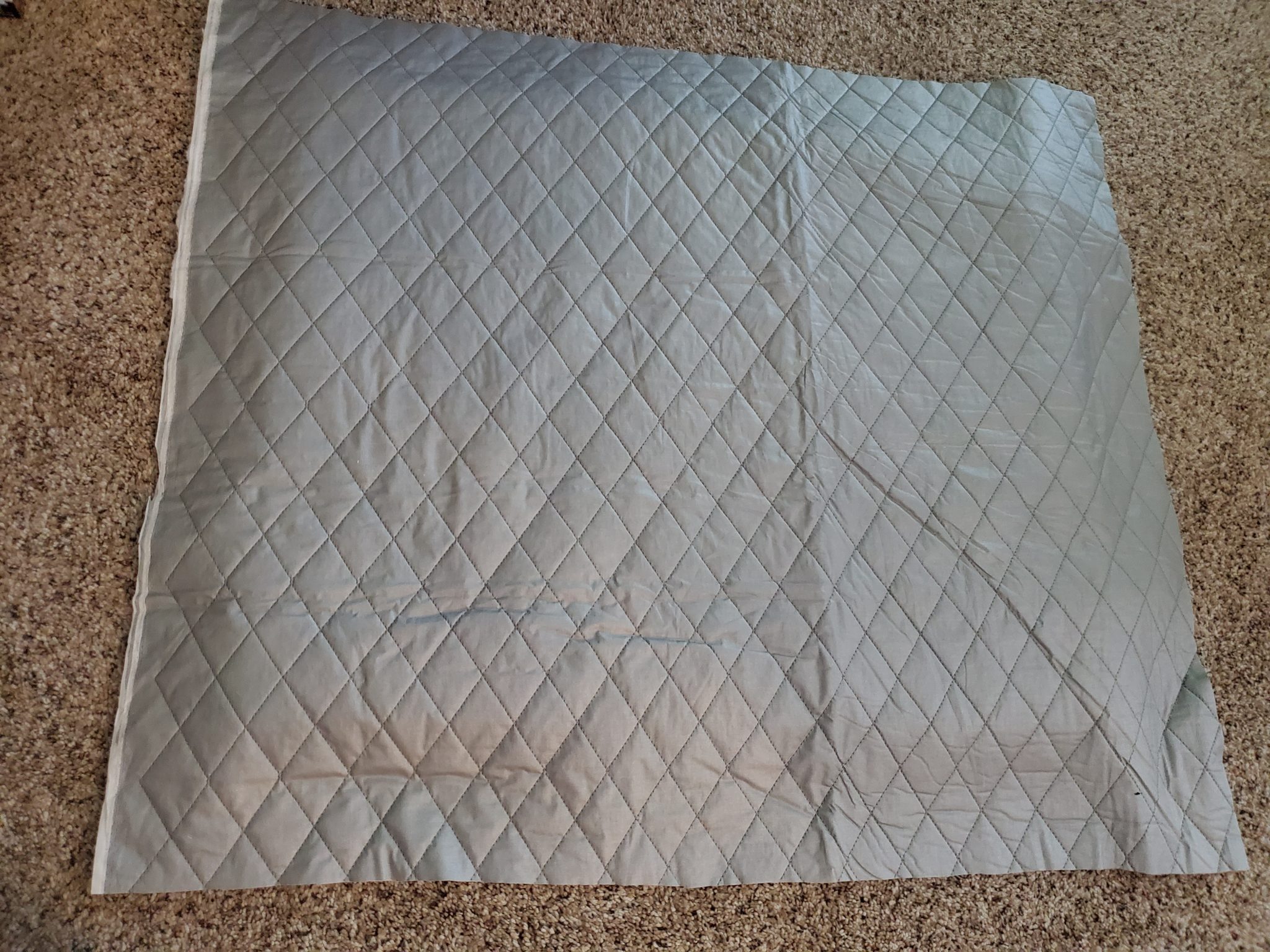 How to Make a DIY Ironing Board Using Wood & Quilted Fabric